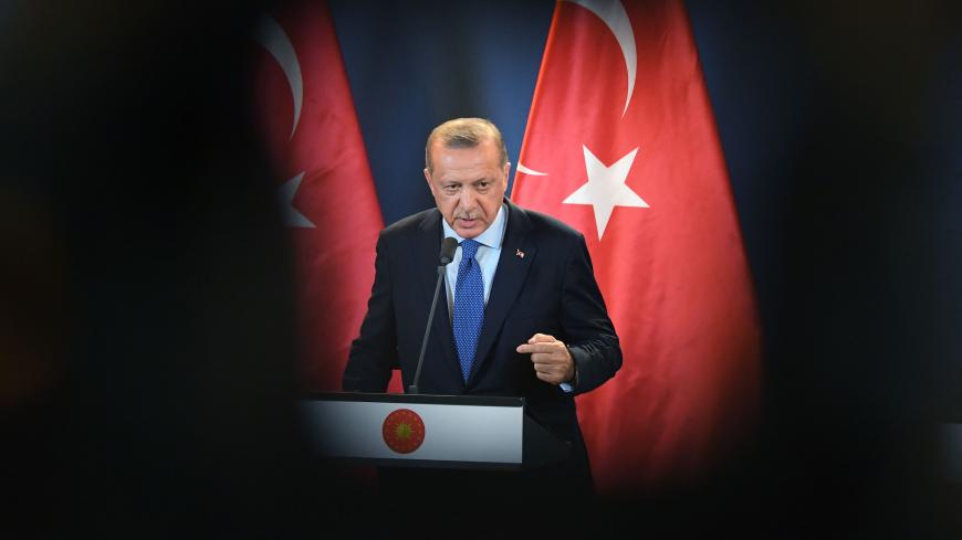 Turkish President Recep Tayyip Erdogan gives a joint press conference with the Hungarian Prime Minister (not in picture) following official talks in the parliament building of Budapest on October 8, 2018. (Photo by ATTILA KISBENEDEK / AFP)        (Photo credit should read ATTILA KISBENEDEK/AFP/Getty Images)
