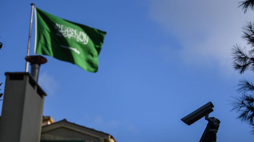 A Saudi Arabian flag flies over as CCTV camera is seen the Saudi Arabian consulate in Istanbul on October 10, 2018. - Jamal Khashoggi, a veteran Saudi journalist who has been critical towards the Saudi government has gone missing after visiting the kingdom's consulate in Istanbul on October 2, 2018, the Washington Post reported. Saudi Arabia agreed to let Turkish authorities search its Istanbul consulate as part of the investigation into the disappearance of journalist Jamal Khashoggi, as his fiancee asked 