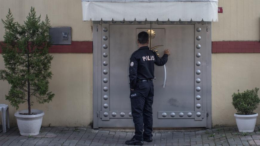 ISTANBUL, TURKEY - OCTOBER 10: A police officer providing security waits at the front door of Saudi Arabia's consulate on October 10, 2018 in Istanbul, Turkey. Fears are growing over the fate of missing journalist Jamal Khashoggi after Turkish officials said they believe he was murdered inside the Saudi consulate. Saudi consulate officials have said that missing writer and Saudi critic Jamal Khashoggi went missing after leaving the consulate, however the statement directly contradicts other sources includ