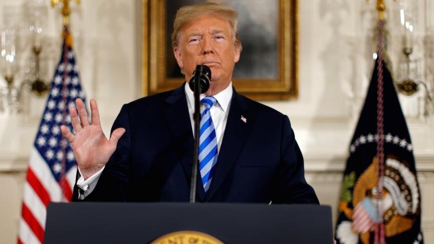 U.S. President Donald Trump announces his intention to withdraw from the JCPOA Iran nuclear agreement during a statement in the Diplomatic Room at the White House in Washington, U.S. May 8, 2018.  REUTERS/Jonathan Ernst - RC1AB8675B40