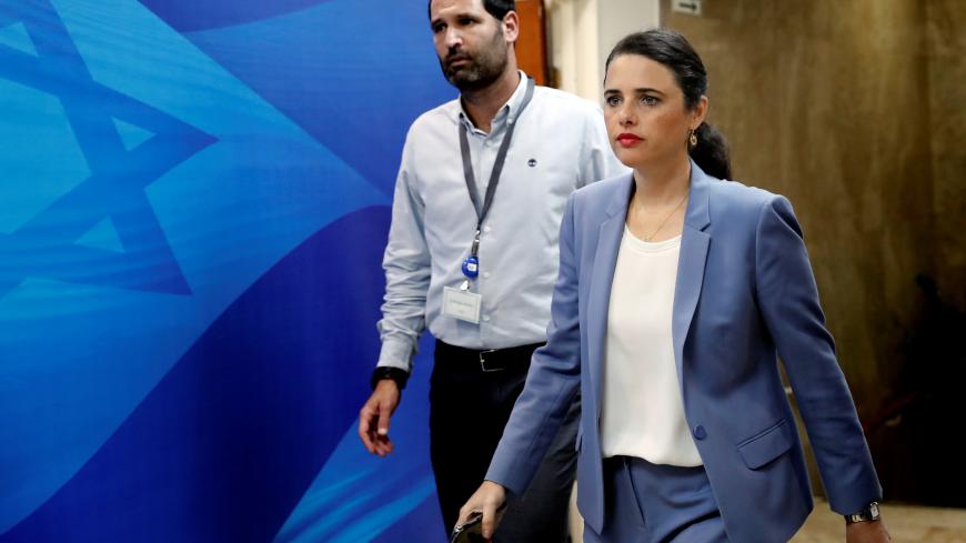 Israeli minister of Justice Ayelet Shaked (R) arrives ahead of the weekly cabinet meeting at the Prime Minister's office in Jerusalem September 12, 2018. Thomas Coex/Pool via Reuters - RC1589D288D0
