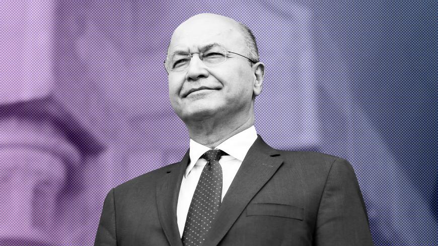 Barham Salih, Iraq's newly elected President stands during a handover ceremony at Salam Palace in Baghdad, Iraq October 3, 2018. REUTERS/Thaier Al-Sudani - RC1F1E655F20
