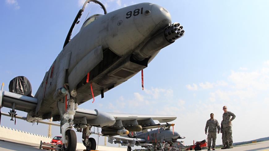 An A-10 thunderbolt is parked on the tarmac at the Namest air force base near Brno where it is taking part in joint NATO military exercises called Ramstein Rover. The exercise is organized and managed by the Air Force Component Command HQ AC Ramstein. It is the largest military exercise in Europe this year with the participation of 16 countries and the objective of increasing coordination between pilots and forward operating air controllers. 
AFP PHOTO/ RADEK MICA        (Photo credit should read RADEK MICA