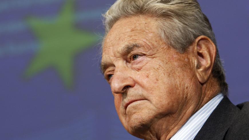 Financier and philanthropist George Soros speaks during the European Roma summit at European Commission headquarters in Brussels September 16, 2008.     REUTERS/Francois Lenoir   (BELGIUM) - GM1E49G1HWT01