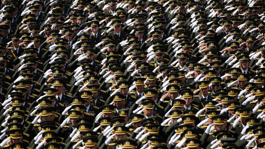 Turkish army officers stand at attention during a ceremony marking the 96th anniversary of Victory Day at the mausoleum of Mustafa Kemal Ataturk in Ankara, Turkey August 30, 2018. REUTERS/Umit Bektas TPX IMAGES OF THE DAY - RC173FEBAEE0