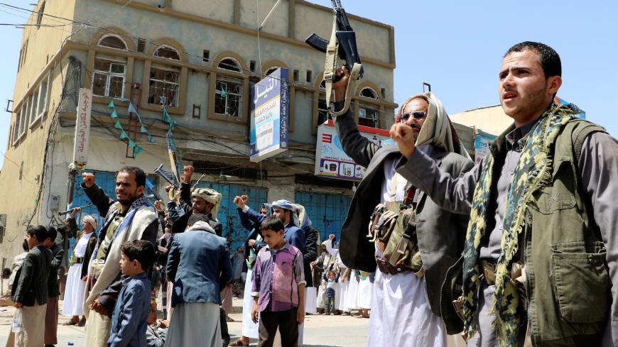 Houthi followers demonstrate to show rejection to an offer by the Saudi-led coalition to pay compensations for victims of an air strike in Saada, Yemen September 5, 2018. REUTERS/Naif Rahma - RC1B734F6900