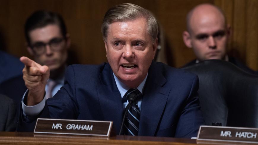 Sen. Lindsey Graham, R-S.C., defends Judge Brett Kavanaugh during the Senate Judiciary Committee hearing on his nomination be an associate justice of the Supreme Court of the United States, focusing on allegations of sexual assault by Kavanaugh against Christine Blasey Ford in the early 1980s, in Washington, DC, U.S., September 27, 2018.  Picture taken September 27, 2018. Tom Williams/Pool via REUTERS - RC1E5B7EC8E0