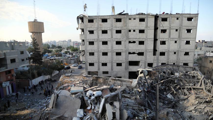A view shows the remains of Hamas's TV station building that was destroyed by Israeli air strikes, in Gaza City November 13, 2018. REUTERS/Suhaib Salem - RC17CE86FB10