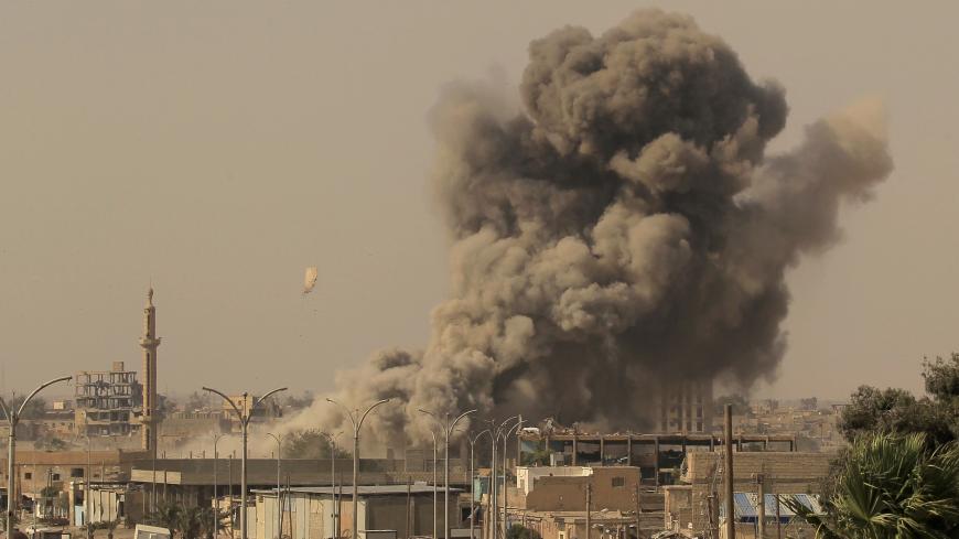Smoke rises after an air strike during fighting between members of the Syrian Democratic Forces and Islamic State militants in Raqqa, Syria, August 15, 2017. Zohra Bensemra: "Access to the frontline of the battle for Raqqa in Syria was more limited than during the battle for Mosul in Iraq. Raqqa’s battle was different also from Mosul’s because we saw very few civilians who managed to escape. We didn’t have daily access. We were often posted in buildings used as a command base or observation point. From ther