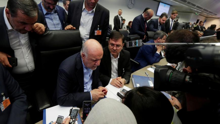 Iran's Oil Minister Bijan Zanganeh talks to journalists at the beginning of an OPEC meeting in Vienna, Austria, June 22, 2018. REUTERS/Heinz-Peter Bader - RC19312B8670