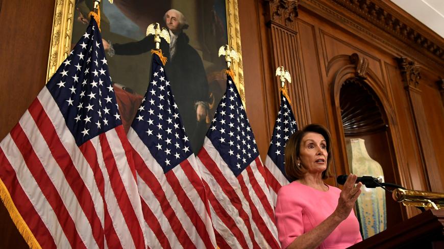 House Minority Leader Nancy Pelosi (D-CA) makes remarks a day after the Midterm Elections, in which the Senate Republicans retained their majority as the House saw Democrats sweep into control, and a possible return as Speaker for Pelosi, on Capitol Hill in Washington, U.S., November 7, 2018. REUTERS/Mike Theiler - RC1CC87E23E0
