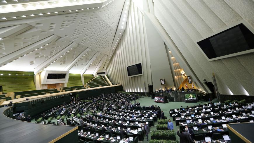 Iranian MPs are seen during a meeting of the Iranian parliament for the impeachment of the Minister of Labor on March 13, 2018. / AFP PHOTO / ATTA KENARE        (Photo credit should read ATTA KENARE/AFP/Getty Images)
