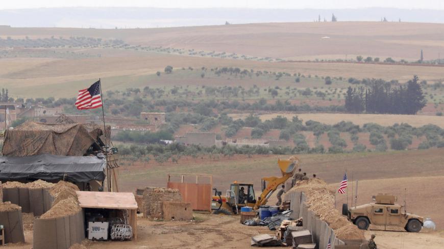 U.S. forces set up a new base in Manbij, Syria May 8, 2018. Picture Taken May 8, 2018. REUTERS/Rodi Said - RC1504520BB0