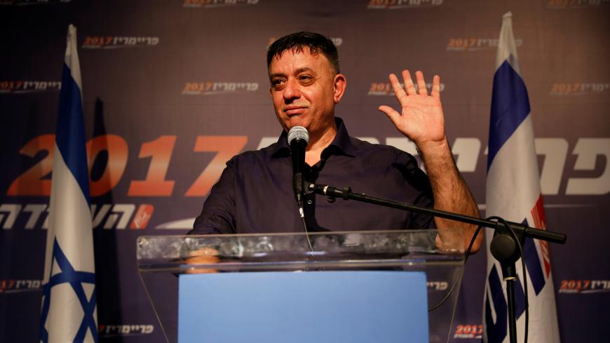 Avi Gabbai, the new leader of Israel's centre-left Labour party, gestures as he delivers his victory speech after winning the Labour party primary runoff, at an event in Tel Aviv, Israel July 10, 2017. REUTERS/Amir Cohen - RC1780888D30
