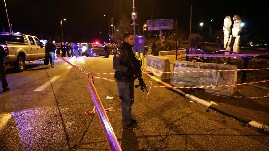 Israeli security forces and emergency personnel work at the scene of what an initial report from the Israeli army said was a shooting attack, near the Israeli settlement of Ofra, in the occupied West Bank December 9, 2018. REUTERS/Ammar Awad - RC15E50E3400