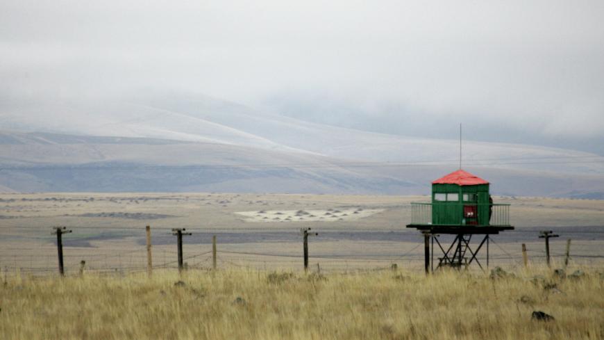 A border tower is seen at the Armenian side of Armenian-Turkish border in the village of Getap, some 85 km (53 miles) north-west of the capital Yerevan, November 1, 2009. The historic prospect of peace with longtime foe Turkey has roused angry opposition among powerful Armenian nationalists, which could yet undermine President Serzh Sarksyan and torpedo the whole process. Picture taken November 1, 2009.  To match analysis ARMENIA-TURKEY/DIVISION  REUTERS/David Mdzinarishvili  (ARMENIA POLITICS CONFLICT) - G