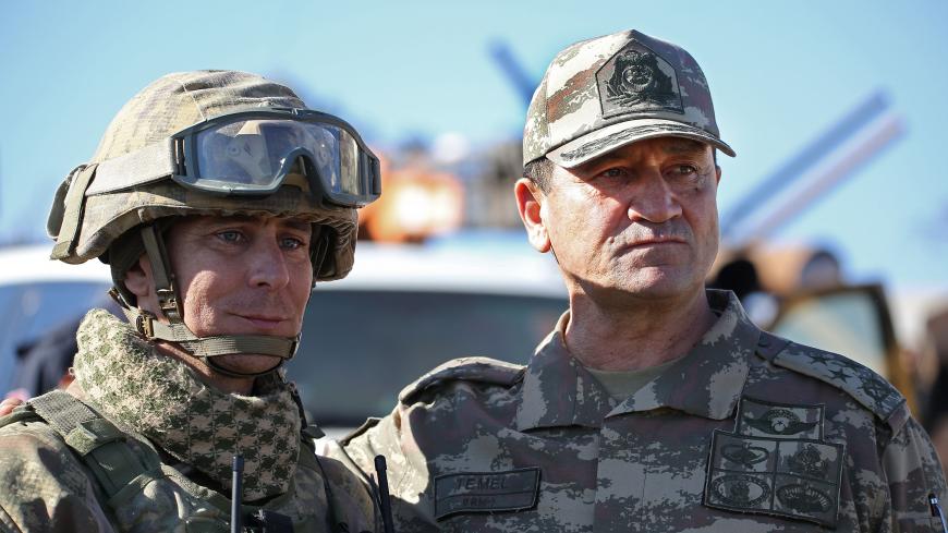 Turkish general Ismail Metin Temel (R), the commander of the Second army and commander of Operation "Olive Branch" against YPG fighters in Afrin visits Mount Bersaya, north of the Syrian town of Azaz near the border with Turkey, on January 29, 2018. 

The Turkish military on January 20 launched operation "Olive Branch", its second major incursion into Syrian territory during the seven-year civil war. The operation, with Turkish war planes and artillery backing a major ground incursion involving Ankara-backe