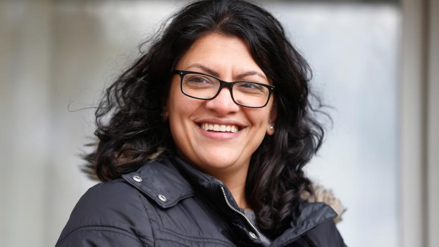 Democratic U.S. congressional candidate Rashida Tlaib canvasses a neighborhood before Election Day in Detroit, Michigan, U.S. November 5, 2018. REUTERS/Rebecca Cook - RC1D480CE1E0