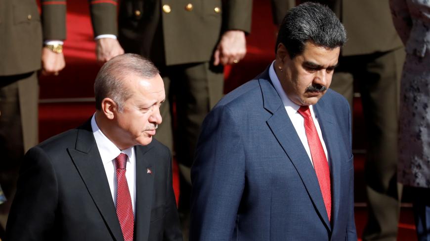 Turkish President Tayyip Erdogan receives military honours upon his arrival at Miraflores Palace in Caracas, Venezuela December 3, 2018. REUTERS/Manaure Quintero - RC14DB2C38B0
