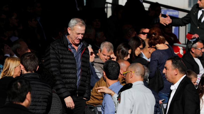 Benny Gantz (C), a former Israeli armed forces chief and the head of a new political party, Israel Resilience, attends a handover ceremony for the incoming Israeli Chief of Staff Aviv Kohavi, at the Defense ministry in Tel Aviv, Israel January 15, 2019. REUTERS/Amir Cohen - RC11D5F4AC90