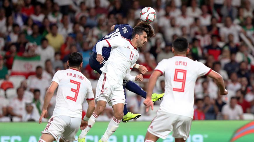Soccer Football - AFC Asian Cup - Semi-Final - Iran v Japan - Hazza Bin Zayed Stadium, Al Ain, United Arab Emirates - January 28, 2019   Iran's Vahid Amiri in action with Japan's Hiroki Sakai      REUTERS/Suhaib Salem - RC18FD209230