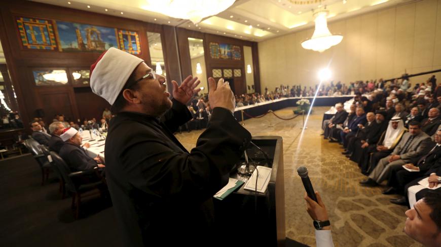 Awqaf Minister Mohamed Mokhtar Gomaa speaks during a conference held by the Awqaf (Religious Affairs) Ministry headquarters in Cairo, May 25, 2015, to discuss the renewal of religious discourse, a proposal by President Abdel Fattah al-Sisi in hopes to confront the extremism that has swept the region in recent years. REUTERS/Mohamed Abd El Ghany - GF10000107128