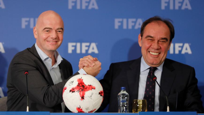 FIFA President Gianni Infantino (L) holds a news conference with Turkish Football Federation (TFF) President Yildirim Demiroren in Istanbul, Turkey, 23, 2017. REUTERS/Osman Orsal - RC117EEE72F0