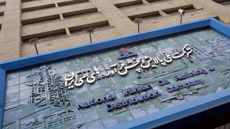 EDITORS' NOTE:  Reuters and other foreign media are subject to Iranian restrictions on their ability to film or take pictures in Tehran.

The front of the National Iranian Oil Refining and Distribution Company building is seen in Tehran November 17, 2009. Iran temporarily boosted gasoline production by about 30 percent on Tuesday to show the West it can cope with any sanctions targeting its fuel imports.   REUTERS/Morteza Nikoubazl (IRAN POLITICS ENERGY BUSINESS) - GM1E5BH1FIK01