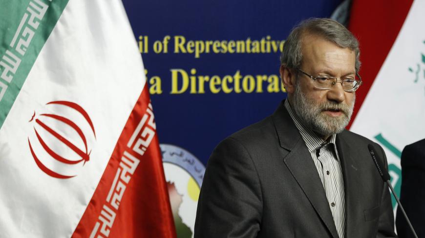 Iran's parliament speaker Ali Larijani speaks during a news conference in Baghdad December 24, 2014. REUTERS/Thaier Al-Sudani (IRAQ - Tags: POLITICS) - GM1EACO1I3601