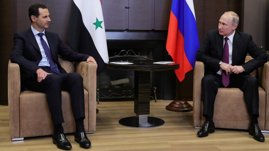 Russian President Vladimir Putin meets with Syrian President Bashar al-Assad in the Black Sea resort of Sochi, Russia May 17, 2018. Sputnik/Mikhail Klimentyev/Kremlin via REUTERS ATTENTION EDITORS - THIS IMAGE WAS PROVIDED BY A THIRD PARTY. - UP1EE5H1HMGEQ