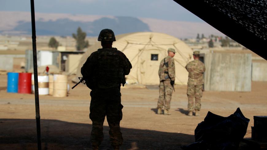 A U.S. soldier from the 2nd Brigade, 82nd Airborne Division stands guard at a military base north of Mosul, Iraq, February 14, 2017. Picture taken February 14, 2017. REUTERS/Khalid al Mousily - RC1D165D9880