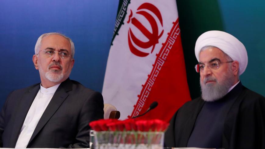 Iranian President Hassan Rouhani (R) and Foreign Minister Mohammad Javad Zarif attend a meeting with Muslim leaders and scholars in Hyderabad, India, February 15, 2018. REUTERS/Danish Siddiqui - RC13BC72B9E0