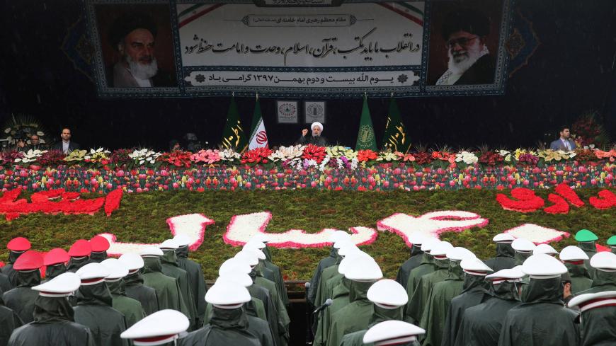Iran's President Hassan Rouhani speaks during a ceremony to mark the 40th anniversary of the Islamic Revolution in Tehran, Iran February 11, 2019. Hossein Zohrevand/Tasnim News Agency/via REUTERS ATTENTION EDITORS - THIS PICTURE WAS PROVIDED BY A THIRD PARTY - RC1FAB501420