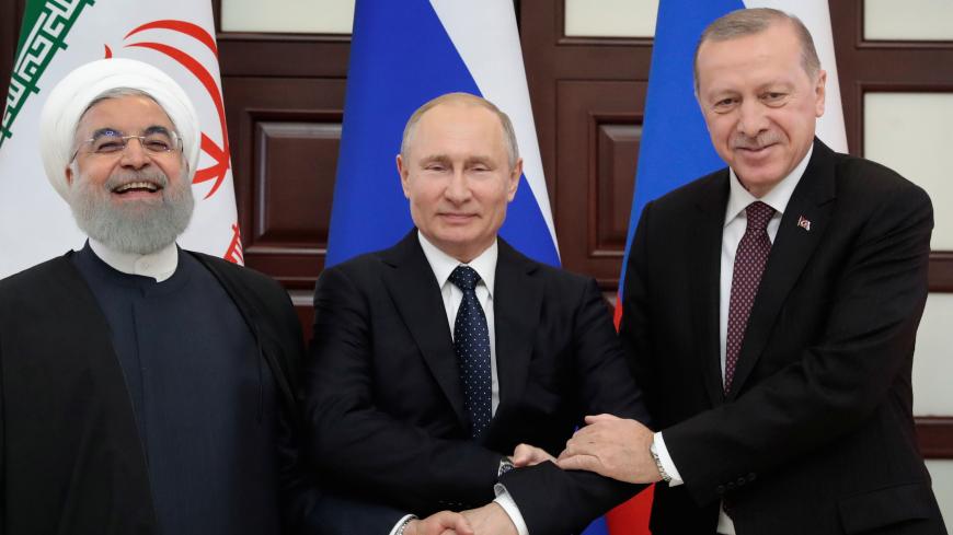 Iranian President Hassan Rouhani, Russian President Vladimir Putin and Turkish President Recep Tayyip Erdogan meet in the Black sea resort of Sochi, Russia, 14 February 2019. Sergei Chirikov/Pool via REUTERS - RC1B409F5F40