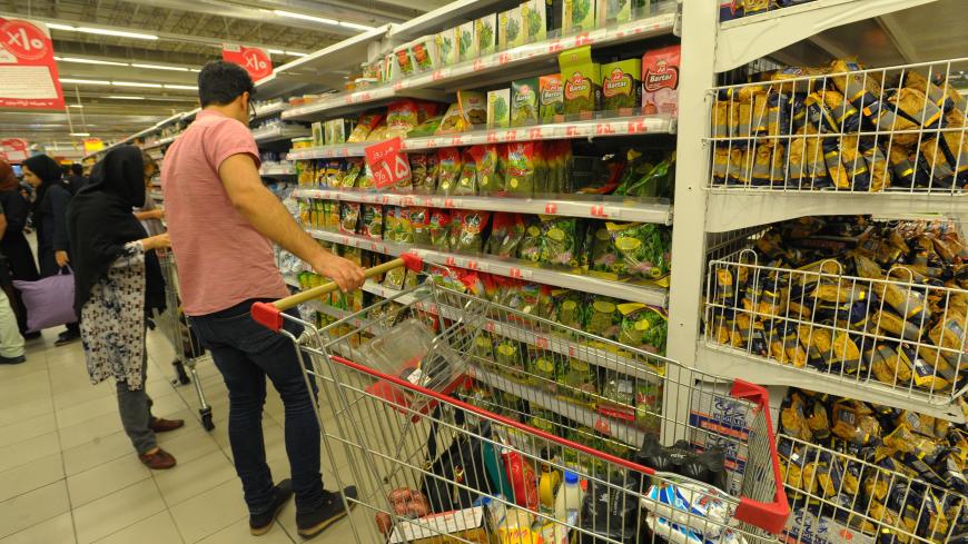 TEHRAN, IRAN - SEPTEMBER 16: Iranians shop for food in a supermarket as they try to lead normal lives as they brace for renewed US sanctions on September 16, 2018 in Tehran, Iran. After President Donald Trump withdrew the US from the 2015 Iran nuclear deal last spring, Washington reimposed one set of sanctions in August, and will impose more on November 4, which are designed to cut-off Iran's oil revenue. So far this year the Iranian currency, the rial, has tumbled in value, prices have soared, and shortage