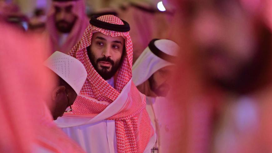 TOPSHOT - Saudi Crown Prince Mohammed bin Salman arrives at the Future Investment Initiative FII conference in the Saudi capital Riyadh on October 24, 2018. - The summit, nicknamed "Davos in the desert", has been overshadowed by growing global outrage over the murder of a Saudi journalist inside the kingdom's consulate in Istanbul. (Photo by GIUSEPPE CACACE / AFP) (Photo credit should read GIUSEPPE CACACE/AFP/Getty Images)