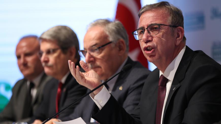 Mansur Yavas, the candidate of Turkey's opposition running for the office of mayor of Ankara in local elections gives a press conference, on March 12, 2019 in Ankara. - Turkish prosecutors have prepared on indictment against main opposition Republican Peoples Party (CHP) Ankara mayoral candidate Mansur Yava? over claims the politician abused his powers while acting as an arbitrator in a legal dispute, Cumhuriyet newspaper reported on March 11, 2019. (Photo by Adem ALTAN / AFP)        (Photo credit should re