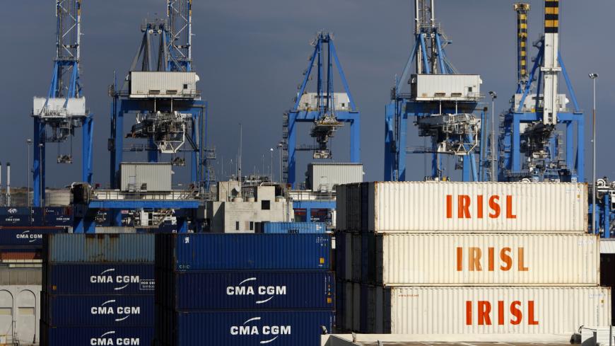 Empty and disused Islamic Republic of Iran Shipping Lines (IRISL Group) containers are seen at Malta Freeport in the Port of Marsaxlokk outside Valletta February 10, 2012. The IRISL ships and containers are key parts in an international cat-and-mouse game: Iran's attempt to evade the trade sanctions tightening around it. Washington and European capitals want to stop or slow Iran's nuclear programme. They believe that IRISL, which moves nearly a third of Iran's exports and imports and is central to the coun
