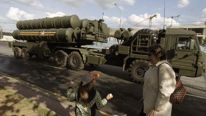 A Russian S-400 air defence mobile missile launching system takes part in a rehearsal for a military parade in Minsk June 26, 2014. Belarus will mark the 70th anniversary of the country's liberation from the Nazis on July 3. REUTERS/Vasily Fedosenko (BELARUS - Tags: MILITARY ANNIVERSARY) - GM1EA6R03KP01