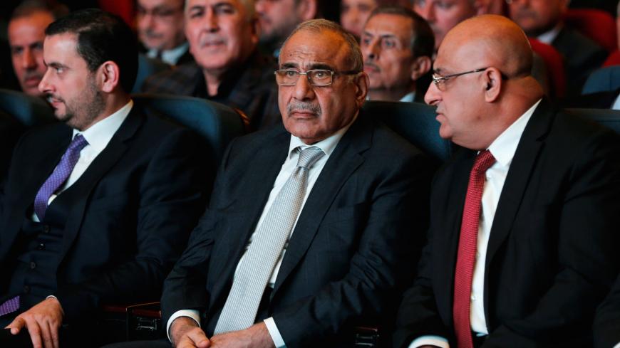 Iraq's Prime Minister Adel Abdul Mahdi (C) attends the opening of Baghdad International Fair, Iraq November 10, 2018. REUTERS/Thaier al-Sudani - RC1551782260