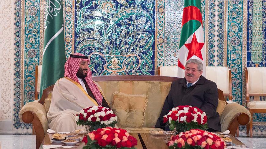 Saudi Arabia's Crown Prince Mohammed bin Salman meets with Algerian Prime Minister Ahmed Ouyahia in Algiers, Algeria December 2, 2018. Picture taken December 2, 2018. Bandar Algaloud/Courtesy of Saudi Royal Court/Handout via REUTERS ATTENTION EDITORS - THIS PICTURE WAS PROVIDED BY A THIRD PARTY. - RC11742D93D0