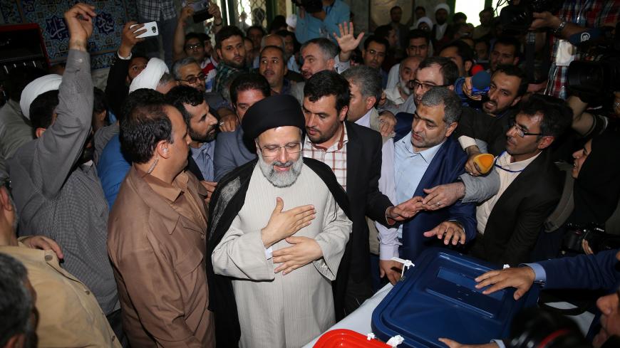 Iranian presidential candidate Ebrahim Raisi gestures as he casts his vote during the presidential election in Tehran, Iran, May 19, 2017. TIMA via REUTERS ATTENTION EDITORS - THIS IMAGE WAS PROVIDED BY A THIRD PARTY. FOR EDITORIAL USE ONLY.     TPX IMAGES OF THE DAY - RC1C429F8270