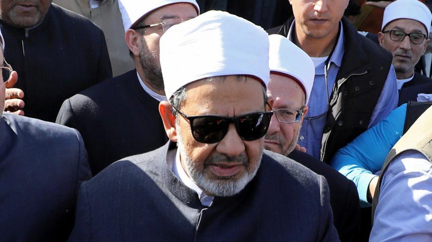 Grand Imam of al-Azhar, Sheikh Ahmed al-Tayeb leaves Al Rawdah mosque during the first Friday prayer after the attack in Bir Al-Abed, Egypt, December 1, 2017. Picture taken December 1, 2017. REUTERS/Mohamed Abd El Ghany - RC170C5C7C20