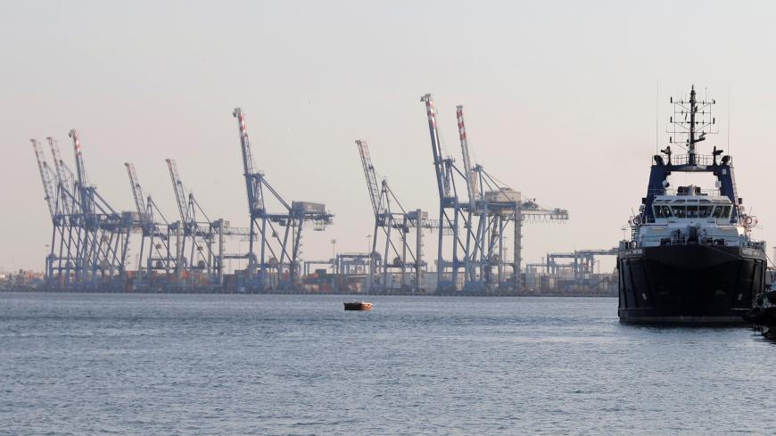 Cranes are seen near the Suez Canal in Port Said, Egypt July 29, 2018. REUTERS/Amr Abdallah Dalsh - RC1C166DBDE0