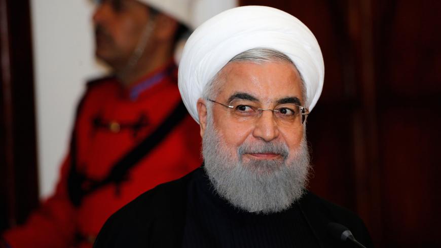 Iranian President Hassan Rouhani speaks during a news conference with Iraq's President Barham Salih (not pictured) at Salam Palace in Baghdad, Iraq March 11, 2019. REUTERS/Thaier al-Sudani - RC1E8AE10620