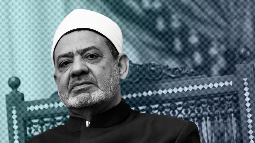 Egyptian Grand Imam of al-Azhar, Sheikh Ahmed al-Tayeb meets with French Prime Minister Manuel Valls (unseen) on October 11, 2015 at the headquarters of al-Azhar, the Sunni Islam's most prestigious centre of learning in the Egyptian capital Cairo. Valls arrived in Cairo the day before at the start of visits to three nations aimed at boosting economic ties and holding talks on regional conflicts, and met with President Abdel Fattah al-Sisi.    AFP PHOTO / KENZO TRIBOUILLARD        (Photo credit should read K