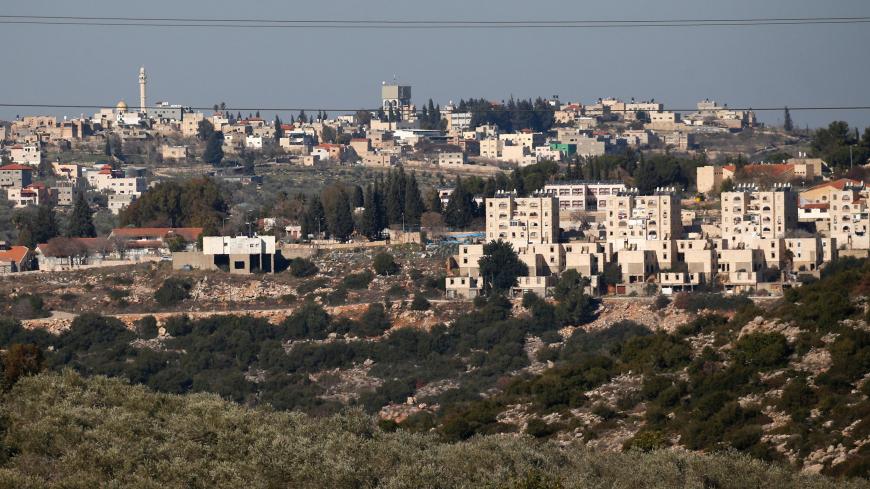 A general view taken on January 23, 2017 from the Palestinian West Bank village of Deir Estia shows the Israeli Jewish settlement of Alei Zahav (foreground) and the Palestinan village of Jinsafut (background). / AFP / JAAFAR ASHTIYEH (Photo credit should read JAAFAR ASHTIYEH/AFP/Getty Images)