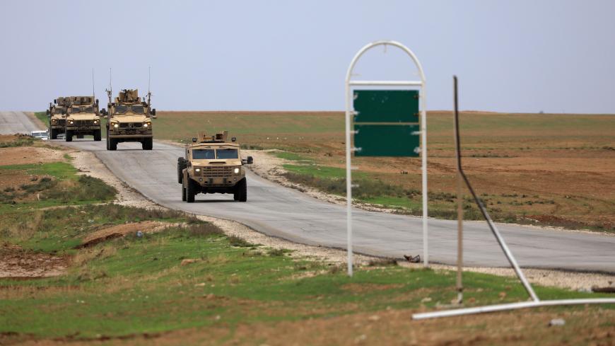 U.S. troops patrol near Turkish border in Hasakah, Syria, November 4, 2018. REUTERS/Rodi Said - RC1F4F72F170