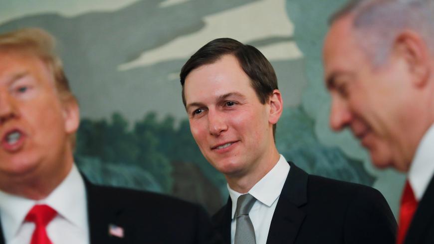 White House senior advisor Jared Kushner smiles while listening to U.S. President Donald Trump talk as the president meets with Israel's Prime Minister Benjamin Netanyahu at the White House in Washington, U.S., March 25, 2019. REUTERS/Carlos Barria - RC1A2FC15190