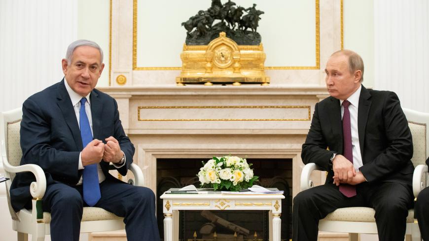 Israeli Prime Minister Benjamin Netanyahu gestures while speaking to Russian President Vladimir Putin during their meeting in the Kremlin in Moscow, Russia, April 4, 2019. Alexander Zemlianichenko/Pool via REUTERS - RC14E837E300